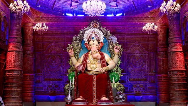 Mumbai's famous Lalbaugcha Raja Sarvajanik Ganeshotsav Mandal unveiled the idol on Monday. Founded in 1934, the Mandal will complete its 89 years this year. Authorities are expecting more footfall this year following a two-year ban on festivities due to COVID. The theme for this year is based on Ayodhya’s Ram temple. Image Courtesy: @LalbaugchaRaja/ Twitter Mumbai's famous Lalbaugcha Raja Sarvajanik Ganeshotsav Mandal unveiled the idol on Monday. Founded in 1934, the Mandal will complete its 89 years this year. Authorities are expecting more footfall this year following a two-year ban on festivities due to COVID. The theme for this year is based on Ayodhya’s Ram temple. Image Courtesy: @LalbaugchaRaja/ Twitter