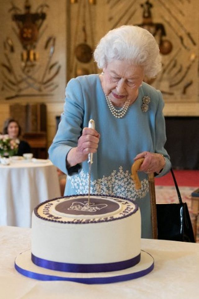 Queen Elizabeth II cuts a cake to mark her Platinum Jubilee celebrations in 2022. The Platinum Jubilee celebration was a sign of how much affection she had received from the public. AFP Queen Elizabeth II cuts a cake to mark her Platinum Jubilee celebrations in 2022. The Platinum Jubilee celebration was a sign of how much affection she had received from the public. AFP