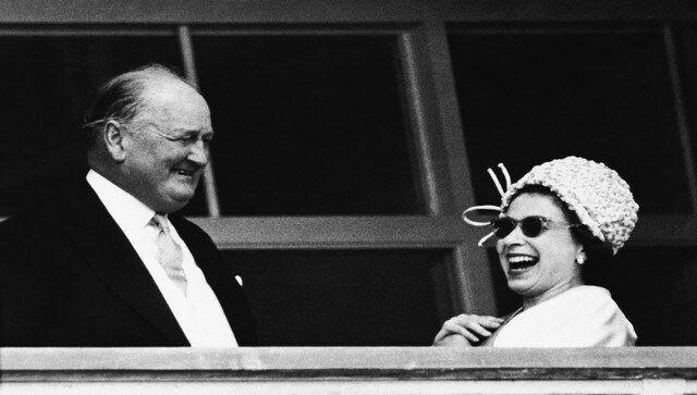 Queen Elizabeth II with her trainer, captain Boyd-Rochfort, before the Derby Stakes at Epsom Downs Racecourse. AP Queen Elizabeth II with her trainer, captain Boyd-Rochfort, before the Derby Stakes at Epsom Downs Racecourse. AP