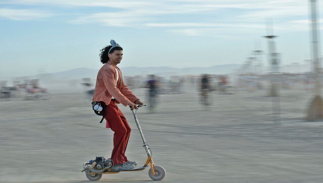 A man riding a scooty at the Burning Man Festival in Nevada’s Black Rock desert. The festival is organised by a non-profit organisation called the Burning Man Project. According to a report by Business Insider, there’s no monetary exchange allowed at the festival and people are allowed to participate in activities like wine tasting and zip lining for free. AP A man riding a scooty at the Burning Man Festival in Nevada’s Black Rock desert. The festival is organised by a non-profit organisation called the Burning Man Project. According to a report by Business Insider, there’s no monetary exchange allowed at the festival and people are allowed to participate in activities like wine tasting and zip lining for free. AP