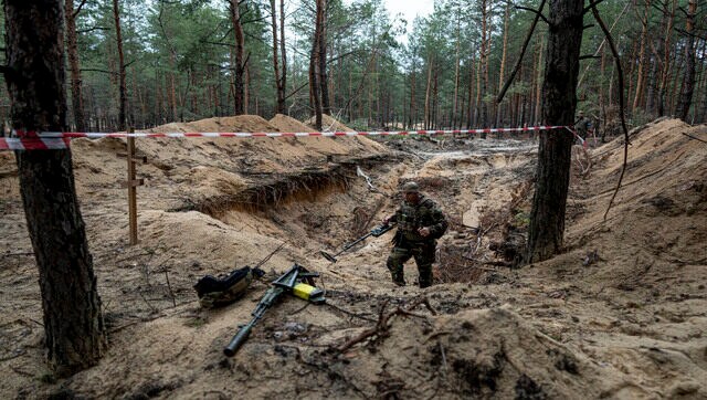 Ukraine: Mass grave with over 440 bodies found in recaptured Izium