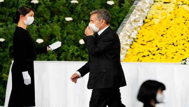 Former President of France Nicolas Sarkozy walks after offering flowers during the state funeral for former Prime Minister Shinzo Abe. AP Former President of France Nicolas Sarkozy walks after offering flowers during the state funeral for former Prime Minister Shinzo Abe. AP