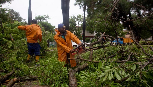 Crews clear fallen trees brought down by the winds of Hurricane Ian, in Havana. The US National Hurricane Centre said that Hurricane Ian struck the country with top sustained winds of 205 km per hour. AP Crews clear fallen trees brought down by the winds of Hurricane Ian, in Havana. The US National Hurricane Centre said that Hurricane Ian struck the country with top sustained winds of 205 km per hour. AP