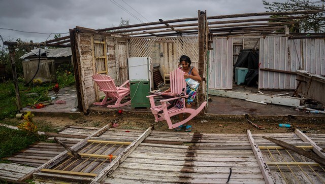 A woman retrieves her belongings from her home damaged by Hurricane Ian in Pinar del Rio. According to a report by BBC, the Cuban government announced that the country’s electrical system is currently experiencing a total collapse. AP A woman retrieves her belongings from her home damaged by Hurricane Ian in Pinar del Rio. According to a report by BBC, the Cuban government announced that the country’s electrical system is currently experiencing a total collapse. AP