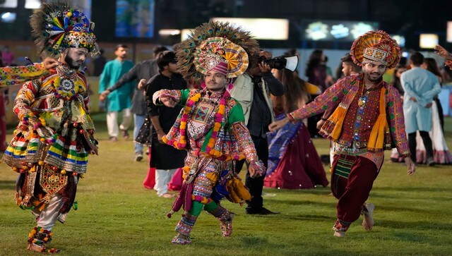 Men and women wear colourful traditional attires to celebrate Navratri. The traditional dance form, garba, originated in the villages of Gujarat where the entire community would participate. AP Men and women wear colourful traditional attires to celebrate Navratri. The traditional dance form, garba, originated in the villages of Gujarat where the entire community would participate. AP