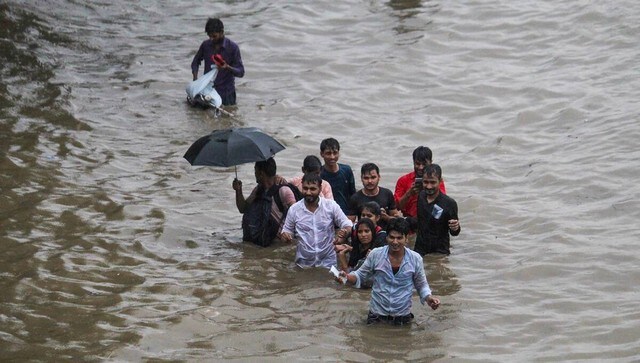 Commuters wade through the waterlogged Delhi-Gurugram Expressway service road after rainfall. According to the district administration on Thursday, Gurugram received 54 mm of rainfall. PTI Commuters wade through the waterlogged Delhi-Gurugram Expressway service road after rainfall. According to the district administration on Thursday, Gurugram received 54 mm of rainfall. PTI
