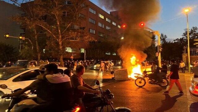 Protests swell in Iran as public anger over death of woman arrested by morality police grows