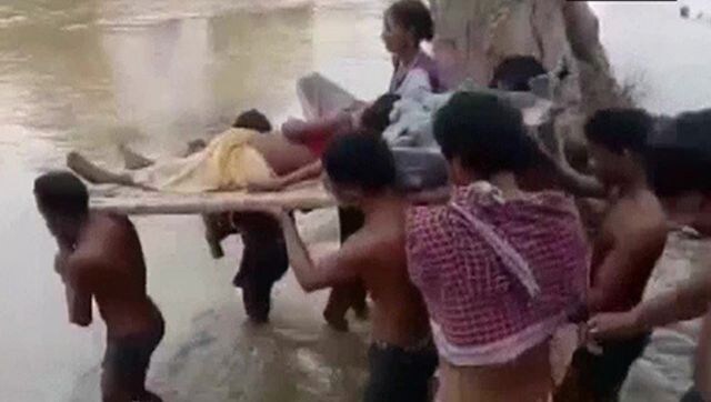 Chattisgarh: Woman taken to hospital on cot as heavy rain cuts off village