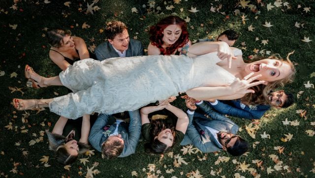 I’m Married! After the bridal party shoot was all done and dusted, the photographer added something a little different to the gallery. Initially wanting to toss the groom up but decided it would be more fun to do it with the bride this time. And so here is the flying bride portrayed with the party guests and then framed by a field of autumn leaves. Image Courtesy: Wenyuan Kuang I’m Married! After the bridal party shoot was all done and dusted, the photographer added something a little different to the gallery. Initially wanting to toss the groom up but decided it would be more fun to do it with the bride this time. And so here is the flying bride portrayed with the party guests and then framed by a field of autumn leaves. Image Courtesy: Wenyuan Kuang
