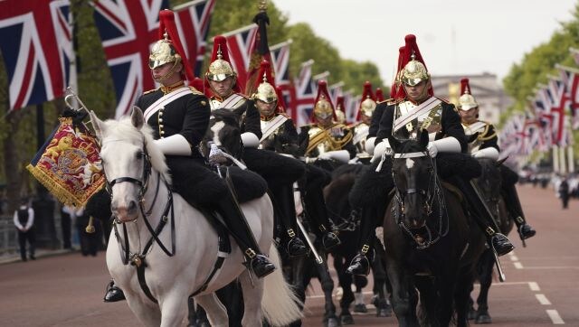 The procession poignantly passed the statue of the Queen’s parents King George VI and the Queen Mother which overlooks The Mall. The Household Cavalry head along the Mall ahead of the procession carrying the Queen’s coffin to Westminster. AP The procession poignantly passed the statue of the Queen’s parents King George VI and the Queen Mother which overlooks The Mall. The Household Cavalry head along the Mall ahead of the procession carrying the Queen’s coffin to Westminster. AP