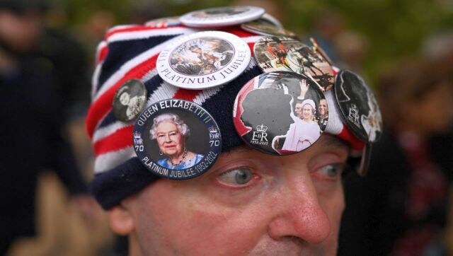 Royal super fan John Loughery, with images of the late Queen Elizabeth II on his hat, poses for a photograph near at Buckingham Palace in London. AFP Royal super fan John Loughery, with images of the late Queen Elizabeth II on his hat, poses for a photograph near at Buckingham Palace in London. AFP