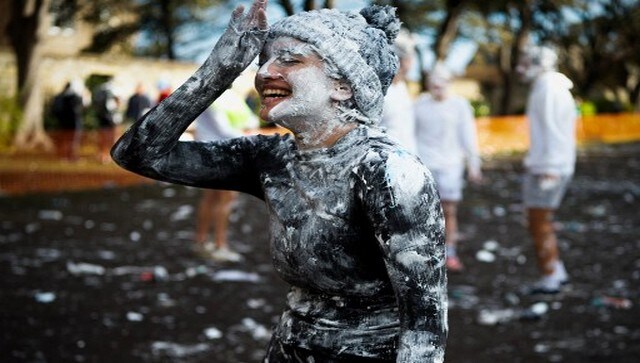 A student covered in foam in the annual ‘Raisin Monday Shaving Foam Fight’. The celebrations date back to when the university was founded in 1413 and is named after a tradition wherein new students used to offer raisins to their academic ‘guardians’ to thank them for welcoming St. Andrews. The academic ‘guardians’ then expect a receipt written in Latin from the children and the failure to produce one resulted in dousing at the local fountain. AFP A student covered in foam in the annual ‘Raisin Monday Shaving Foam Fight’. The celebrations date back to when the university was founded in 1413 and is named after a tradition wherein new students used to offer raisins to their academic ‘guardians’ to thank them for welcoming St. Andrews. The academic ‘guardians’ then expect a receipt written in Latin from the children and the failure to produce one resulted in dousing at the local fountain. AFP