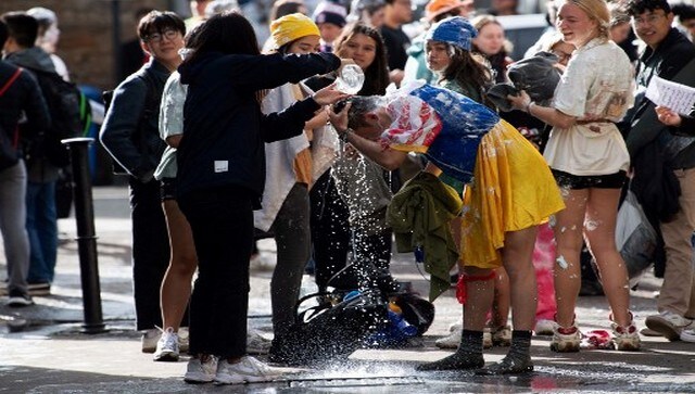 Students getting cleaned up after the foam fight. Traditionally, the University’s Deputy Principal and Master of the United College holds a hose pipe to help students clean up after the foam party. AFP Students getting cleaned up after the foam fight. Traditionally, the University’s Deputy Principal and Master of the United College holds a hose pipe to help students clean up after the foam party. AFP