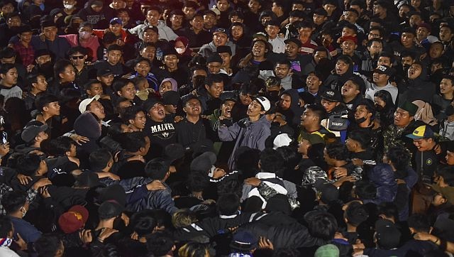 Explained: The stadium stampede exposes troubled history of football in Indonesia