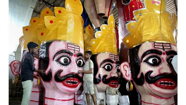 Artisans give final touches to effigies of Raavan ahead of Dussehra in Bhopal. Dussehra marks the end of the festivals of Navratri and Durga Puja. PTI Artisans give final touches to effigies of Raavan ahead of Dussehra in Bhopal. Dussehra marks the end of the festivals of Navratri and Durga Puja. PTI
