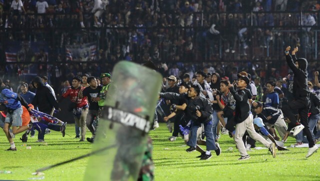 At least 125 dead after stampede, riot at Indonesia football match
