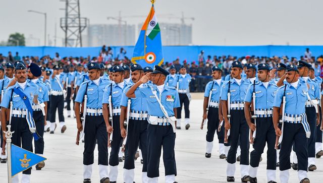 The air force personnel marched past as IAF helicopters put up a marvellous performance in the skies. PTI Photo The air force personnel marched past as IAF helicopters put up a marvellous performance in the skies. PTI Photo