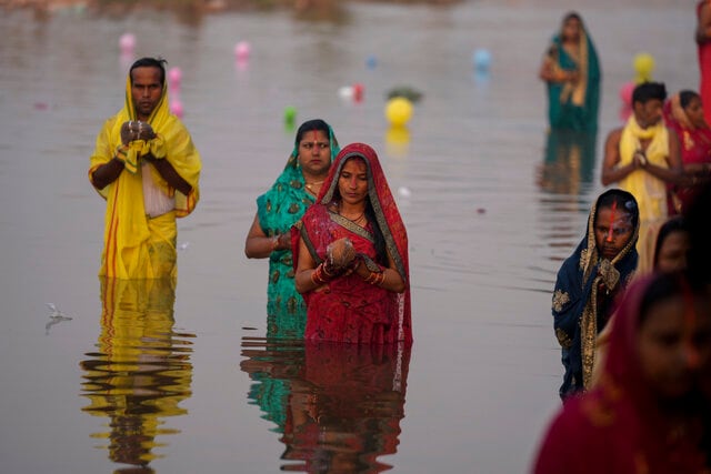 Hindu devotees perform rituals at sunset on the Tawi River banks in Jammu, India, 30 Oct 2022. During Chhath, an ancient Hindu festival, rituals are performed to thank Sun god Lord Surya for sustaining life on earth. Devotees also offer prayers to his sister Chhathi Maiya. AP Hindu devotees perform rituals at sunset on the Tawi River banks in Jammu, India, 30 Oct 2022. During Chhath, an ancient Hindu festival, rituals are performed to thank Sun god Lord Surya for sustaining life on earth. Devotees also offer prayers to his sister Chhathi Maiya. AP