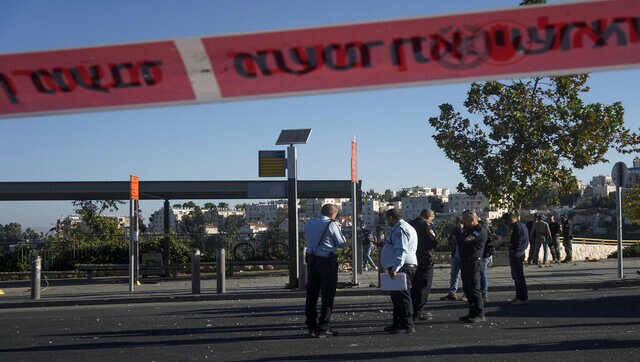 Jerusalem: One dead, at least 14 injured in twin bus stop blasts Jerusalem: One dead, at least 14 injured in twin bus stop blasts