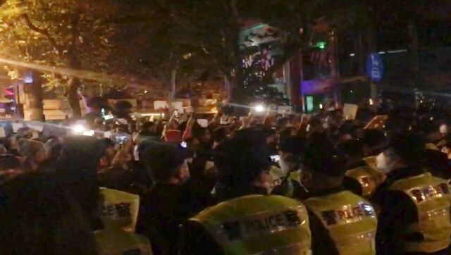 'Unlock Xinjiang, unlock China': Protests over China's COVID controls spread across country