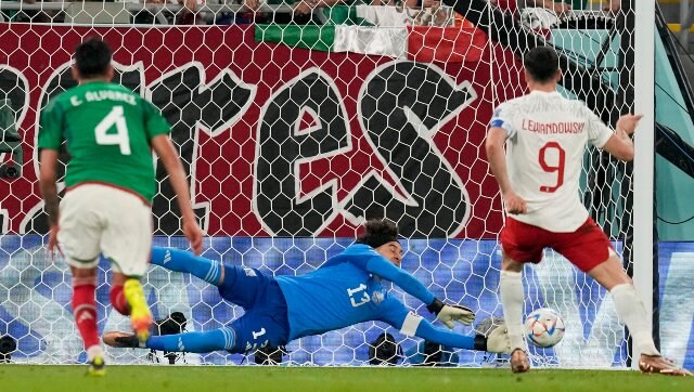FIFA World Cup: Poland's 'emotional' Robert Lewandowski misses penalty in Mexico stalemate