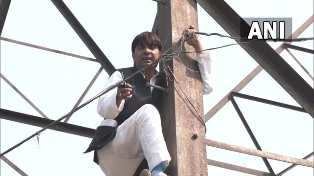 WATCH: Former AAP councillor climbs tower after party denied him Delhi civic polls ticket