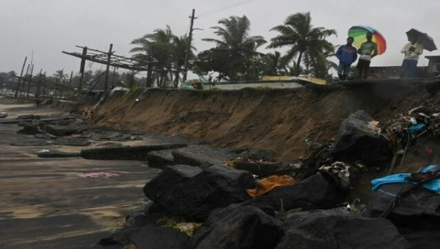 Uprooted trees, waterlogged roads, cancelled flights: How Cyclone Mandous is wreaking havoc in Tamil Nadu Uprooted trees, waterlogged roads, cancelled flights: How Cyclone Mandous is wreaking havoc in Tamil Nadu