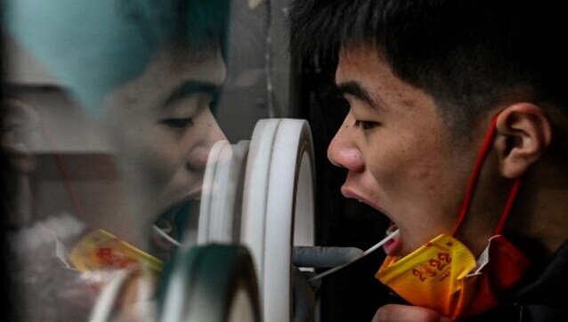 Japan to lower COVID-19 to flu status, further easing rules Japan to lower COVID-19 to flu status, further easing rules