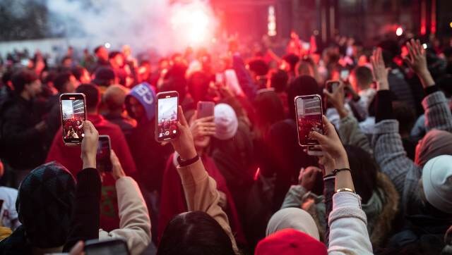Ecstatic Moroccans celebrated after their team qualified for the knockout stages of the World Cup for the first time since 1986. AP Ecstatic Moroccans celebrated after their team qualified for the knockout stages of the World Cup for the first time since 1986. AP