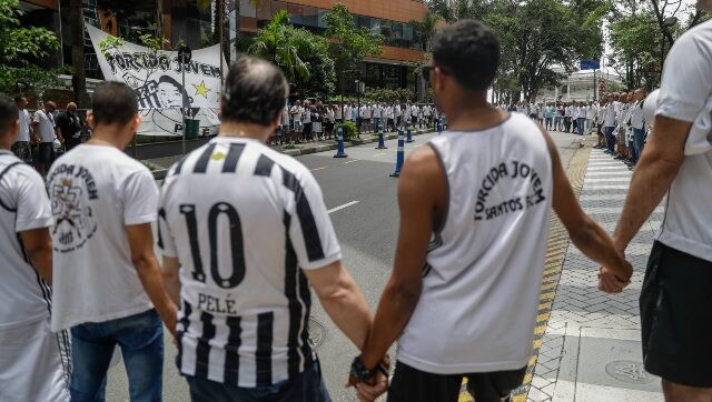 'Long live the king': Pele's fans keep vigil outside Brazil hospital