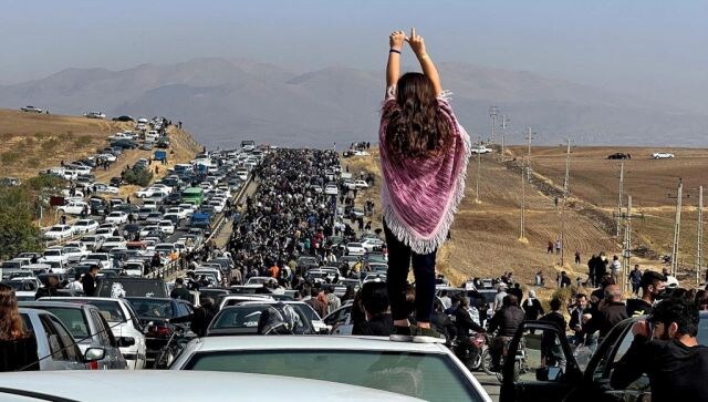 Confusion over status of Iran's religious police grows as more women drop hijab