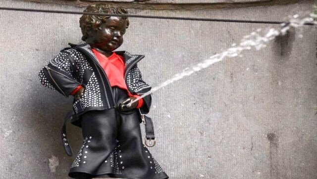 Spray Attack: A picture shows the Manneken Pis statue dressed in tribute to late French-Belgian singer Johnny Hallyday on the fifth anniversary of his death in Brussels. AFP Spray Attack: A picture shows the Manneken Pis statue dressed in tribute to late French-Belgian singer Johnny Hallyday on the fifth anniversary of his death in Brussels. AFP