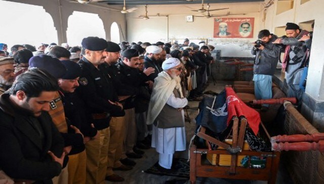 At least 20 of the police officers were later buried after a prayer ceremony, with coffins lined up in rows and draped in the Pakistani flag. They were laid to rest with a guard of honour. AFP At least 20 of the police officers were later buried after a prayer ceremony, with coffins lined up in rows and draped in the Pakistani flag. They were laid to rest with a guard of honour. AFP