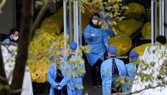 China reports nearly 60,000 deaths due to Covid-19 complications in 35 days China reports nearly 60,000 deaths due to Covid-19 complications in 35 days