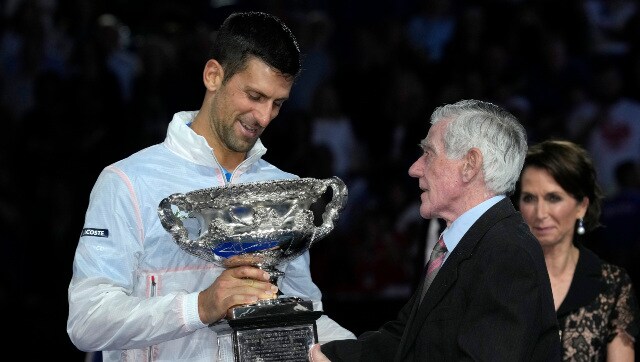 2023 Australian Open champion Novak Djokovic receives the Norman Brookes Challenge Cup from Australian tennis legend Ken Rosewell during the presentation ceremony after the final. AP 2023 Australian Open champion Novak Djokovic receives the Norman Brookes Challenge Cup from Australian tennis legend Ken Rosewell during the presentation ceremony after the final. AP