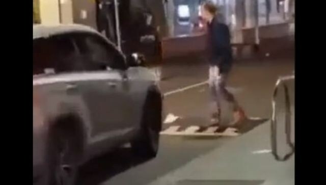 Watch: Man blocking busy street repeatedly neglects car horn; here's what happened next