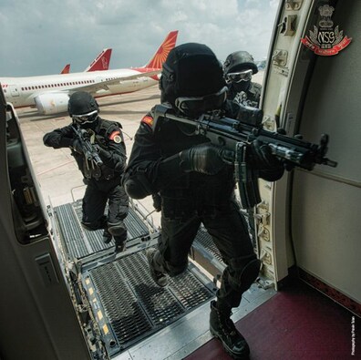 Defying fear in the air: An NSG team showcases an aircraft intervention during an anti-hijack operation. The history of NSG is replete with glorious instances ofsuccessful anti-terrorist operations. Image Courtesy: Pravin Talan Defying fear in the air: An NSG team showcases an aircraft intervention during an anti-hijack operation. The history of NSG is replete with glorious instances ofsuccessful anti-terrorist operations. Image Courtesy: Pravin Talan