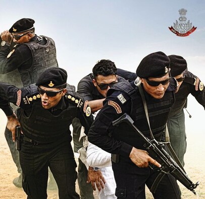 Wall of Protection: NSG commandos show off their VIP protection skills. The NSG today is tasked with protecting the prime minister of the country and they perform this task with elan. Image Courtesy: Pravin Talan Wall of Protection: NSG commandos show off their VIP protection skills. The NSG today is tasked with protecting the prime minister of the country and they perform this task with elan. Image Courtesy: Pravin Talan