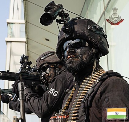 Dare the stares: A fully-equipped surveillance team during an operation. Personnel of the NSG, the best from the army, the para-military and the police forces, are ever ready for service to the nation with utmost commitment and dedication. Image Courtesy: Pravin Talan Dare the stares: A fully-equipped surveillance team during an operation. Personnel of the NSG, the best from the army, the para-military and the police forces, are ever ready for service to the nation with utmost commitment and dedication. Image Courtesy: Pravin Talan