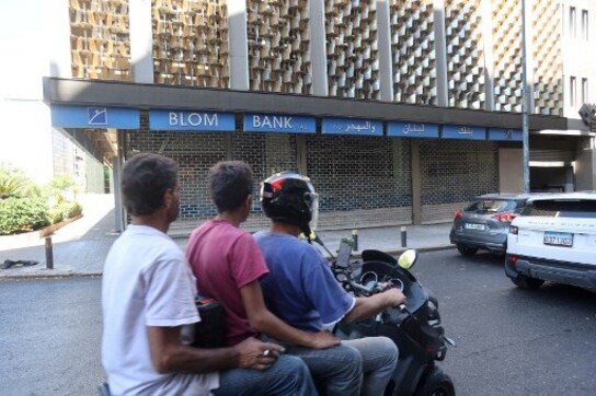 Lebanon central bank 'freezes' accounts of individuals sanctioned by US over links to Hezbollah Lebanon central bank 'freezes' accounts of individuals sanctioned by US over links to Hezbollah