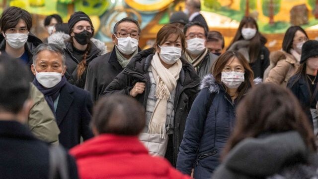 Japan's government eases mask guidelines, but few are keen to change Japan's government eases mask guidelines, but few are keen to change