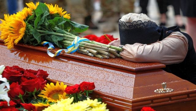 The fighting continued into July, over 100 days since it first began. Casualties continued mounting on both sides and families of thousands mourned the loss of their loved ones. Mother of Major Andrii Verkhohliad, a Ukrainian serviceman who was killed in a battle against Russian troops, rests her head on the coffin containing his body during a funeral ceremony. Reuters The fighting continued into July, over 100 days since it first began. Casualties continued mounting on both sides and families of thousands mourned the loss of their loved ones. Mother of Major Andrii Verkhohliad, a Ukrainian serviceman who was killed in a battle against Russian troops, rests her head on the coffin containing his body during a funeral ceremony. Reuters