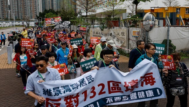 Hong Kong police keep tight tabs on first authorised protest in years