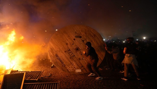 At the elegant Place de Concorde, a festive protest by several thousand, with chants, dancing and a huge bonfire, degenerated into a scene echoing the night before. AP At the elegant Place de Concorde, a festive protest by several thousand, with chants, dancing and a huge bonfire, degenerated into a scene echoing the night before. AP