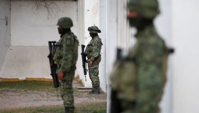 Ukrainian soldiers wait to reinforce 'real hell' of Bakhmut