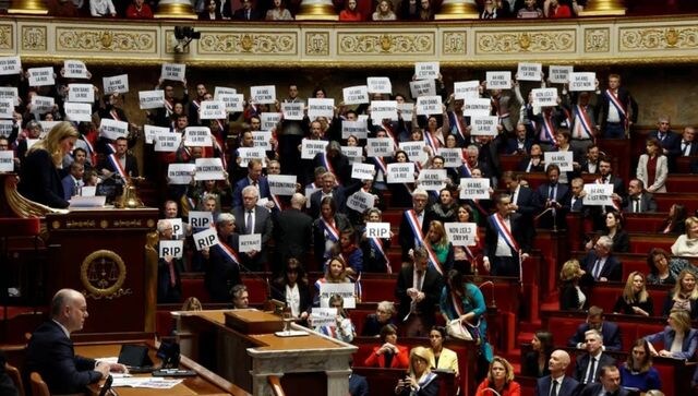 Macron to address nation after government survives no-confidence vote