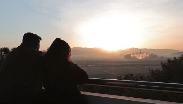 Kim Jong Un and daughter oversee North Korea's ICBM launch