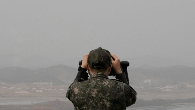 North Korea test-fires two short range ballistic missiles as US sends carrier