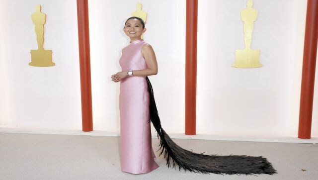 Hong Chau, the star of The Whale and Best Supporting Actress nominee, oozed classic elegance in her Prada gown. The pretty-in-pink moment was elevated with the black sequined feather trail that gave the look a dark, sensual mystique. AP Hong Chau, the star of The Whale and Best Supporting Actress nominee, oozed classic elegance in her Prada gown. The pretty-in-pink moment was elevated with the black sequined feather trail that gave the look a dark, sensual mystique. AP