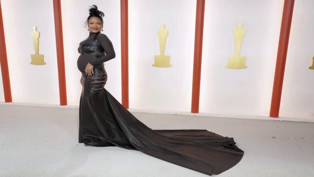 Rihanna, nominated for Best Original song for “Lift Me Up” from the Black Panther: Wakanda Forever, showed the world just how to dress up a baby bump. The singer, expecting her second child, wore a sheer black form-fitting Alaïa dress. The stunning gown had cut-out detailing along each hip for a flash of skin to complete the eye-catching look. AP Rihanna, nominated for Best Original song for “Lift Me Up” from the Black Panther: Wakanda Forever, showed the world just how to dress up a baby bump. The singer, expecting her second child, wore a sheer black form-fitting Alaïa dress. The stunning gown had cut-out detailing along each hip for a flash of skin to complete the eye-catching look. AP